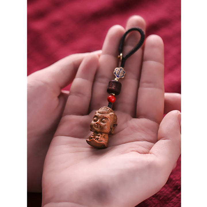 Schlüsselanhänger Buddha Sandelholz Om Mani Glücksbringer Handgeschnitzt spirituell
