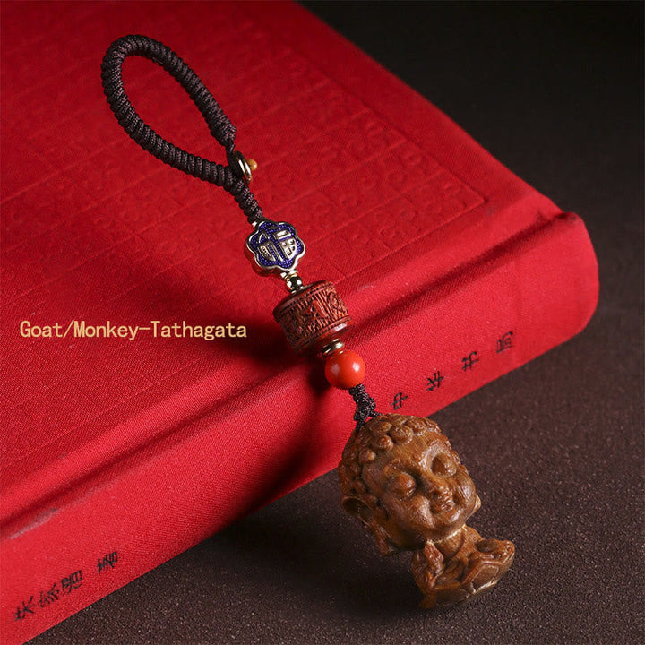 Schlüsselanhänger Buddha Sandelholz Om Mani Goat/Monkey-Tathagata