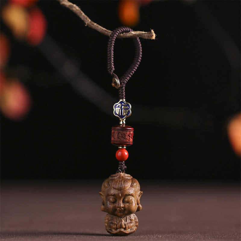 Schlüsselanhänger Buddha Sandelholz Om Mani Gebetsmühle Glücksbringer spirituell handgeschnitzt