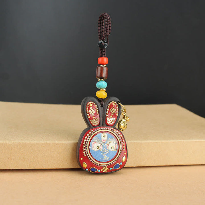 Schlüsselanhänger Ebenholz Thangka – Wohlstand Blue God of Wealth