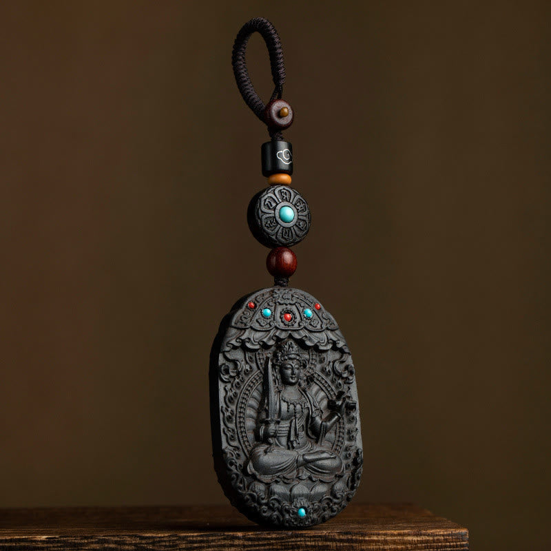 Schlüsselanhänger Natal Buddha Ebenholz – Segen Schutzamulett spirituell handgeschnitzt Türkis