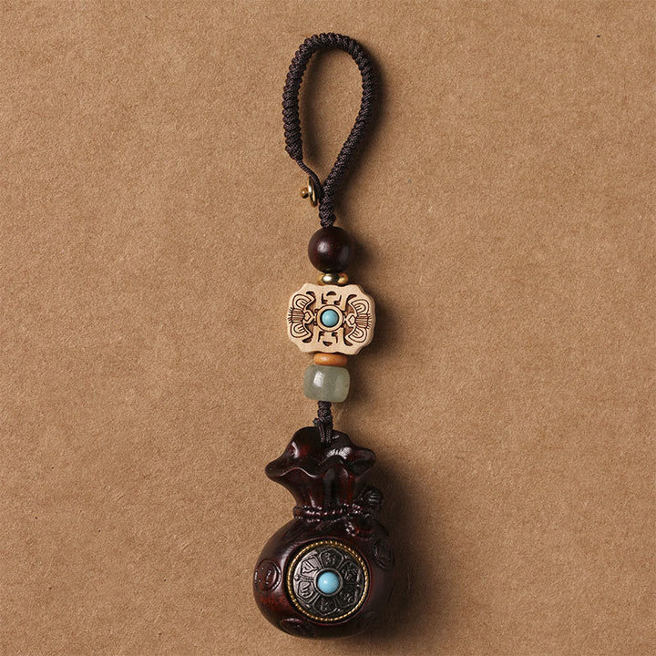 Schlüsselanhänger Sandelholz Om Mani – Ruhe Small Leaf Red Sandalwood