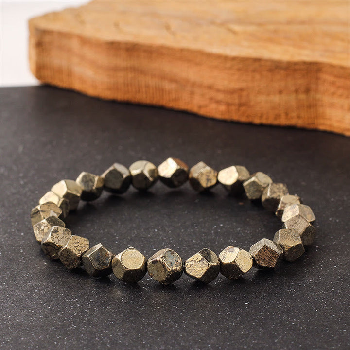 Armband Pyrit Buddha – Schutz & Vertrauen facettierte Perlen auf Stein