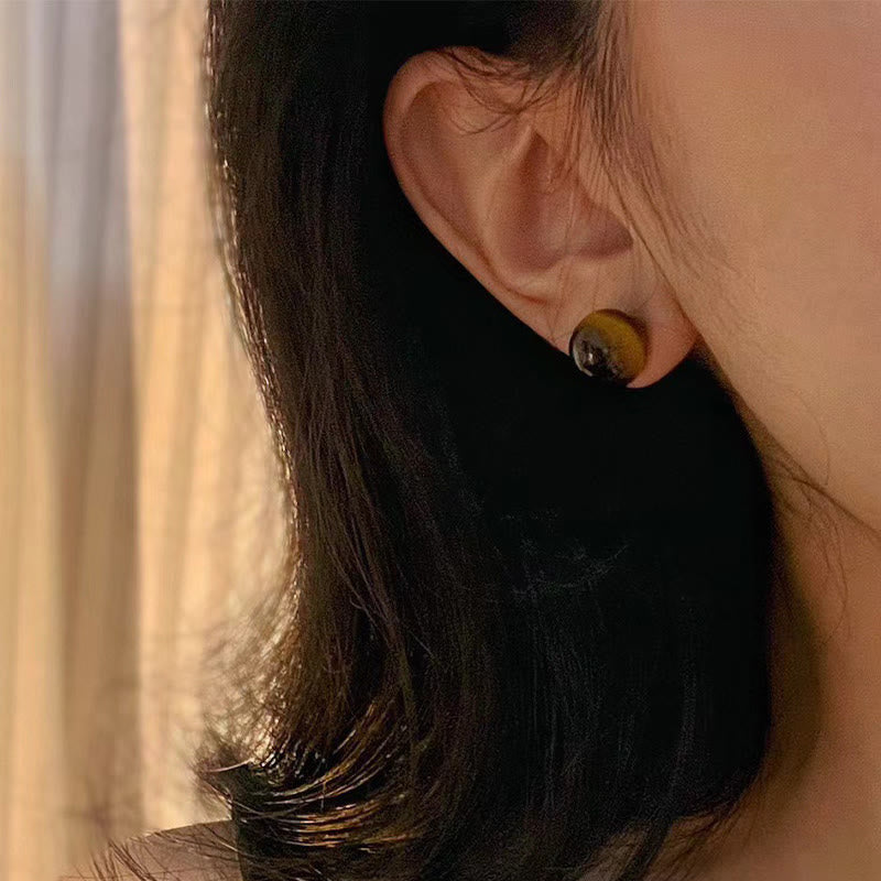 Tigerauge Ohrringe getragen Ohrstecker Schutz Boho Schmuck spirituell Edelstein