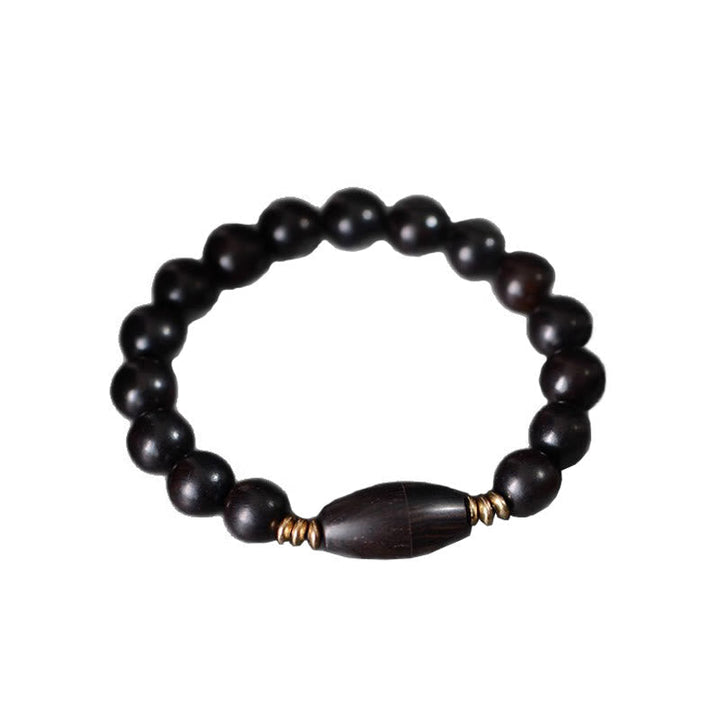 Armband Ebenholz – Schutz & Segen mit Holzperlen und goldenen Akzenten