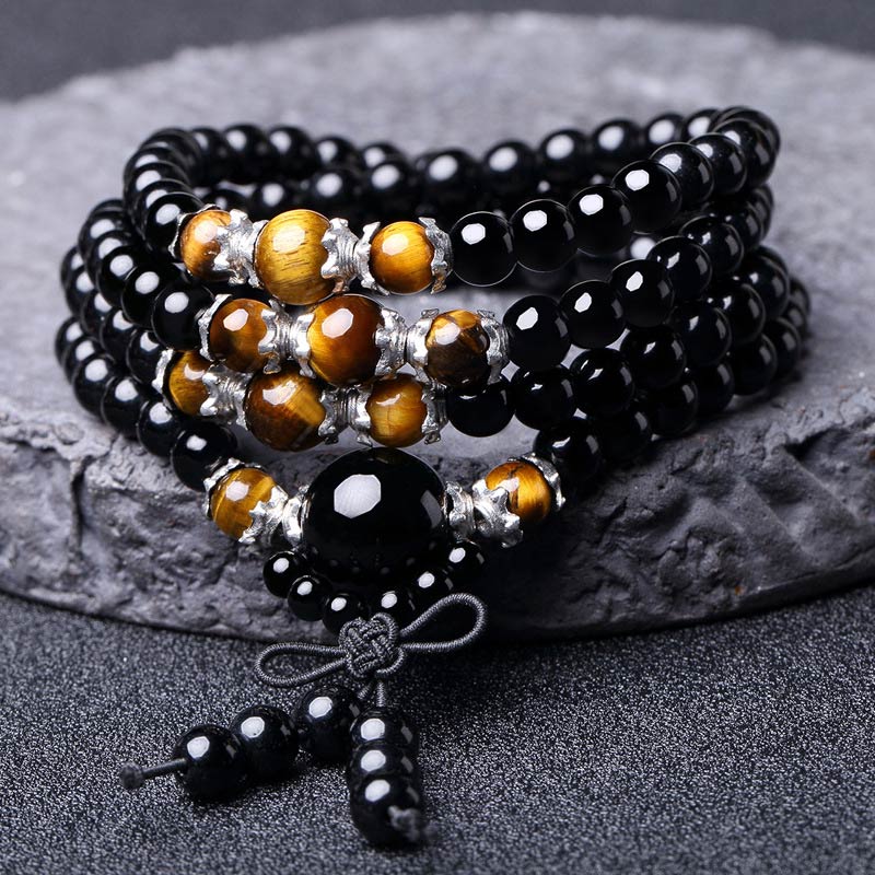 Armband Schwarzer Obsidian Tigerauge Mala mit silbernen Perlen und Quaste