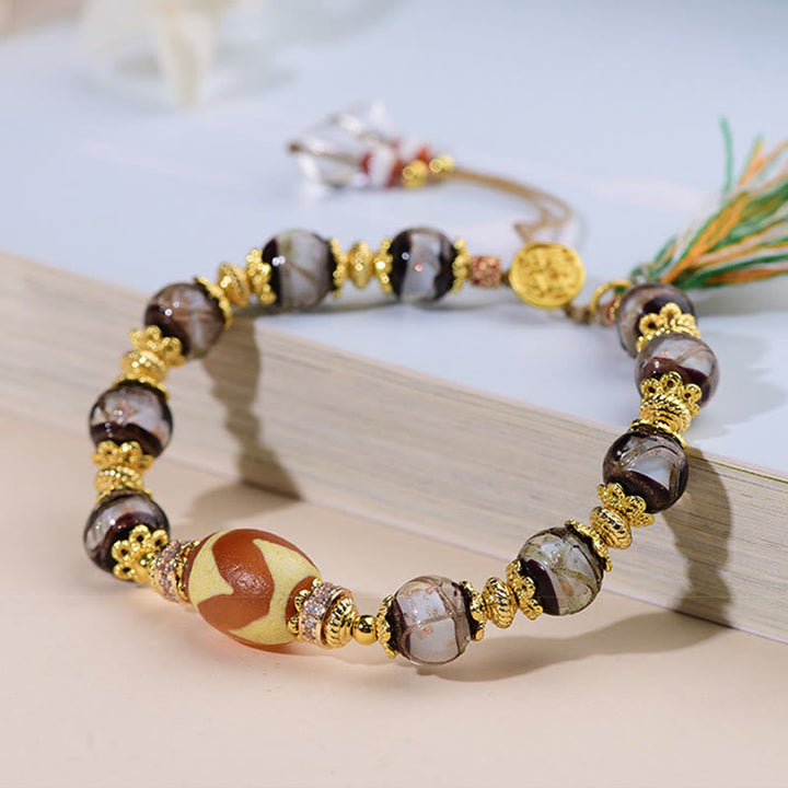 Armband Liuli – Segen mit Dzi Perle goldenen Verzierungen Quaste Handgelenk