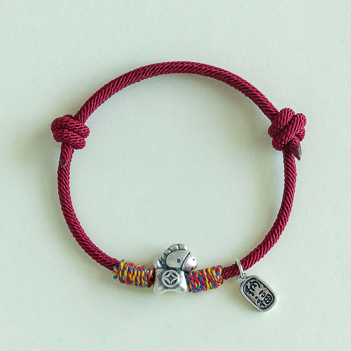Armband Silber 999 Pferd-Motiv Fu-Zeichen rote Kordel Glück Wohlstand