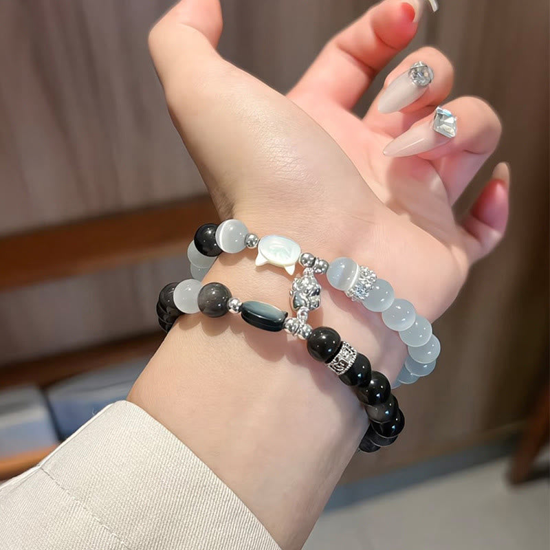 Armband Silber Obsidian Katze Positivität am Handgelenk getragen Perlen Schmuck