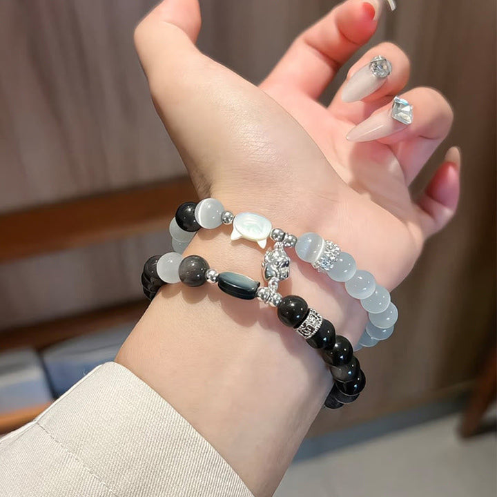 Armband Silber Obsidian Katze Positivität am Handgelenk getragen Perlen Schmuck