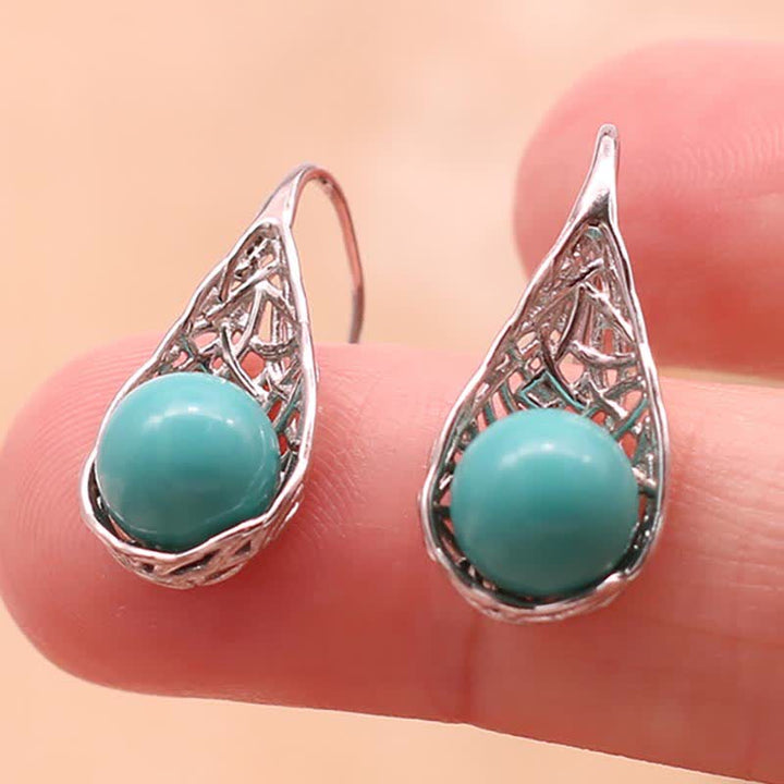 Türkis Ohrringe Silber Tropfen filigran getragen Boho Schmuck spirituell