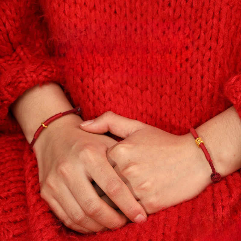 Armband 999 Gold Geflochten Rot Glück am Handgelenk getragen Schutz Glücksbringer
