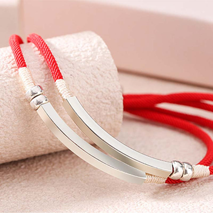 Armband Sterlingsilber Rote Schnur elegant getragen Schutz Glück Handgelenk