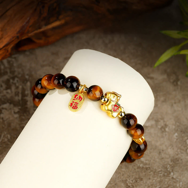 Armband Tigerauge Jahr Des Pferdes – Mut mit goldenem Pferd Anhänger