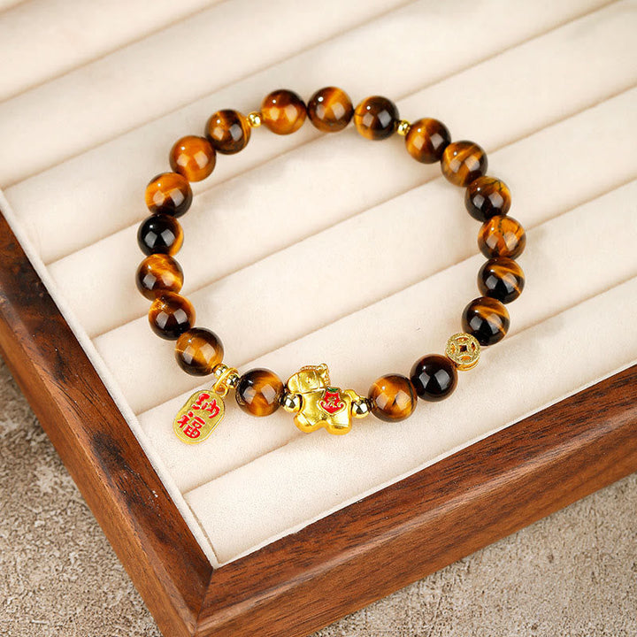 Armband Tigerauge Jahr Des Pferdes – Mut mit goldenem Pferd Anhänger