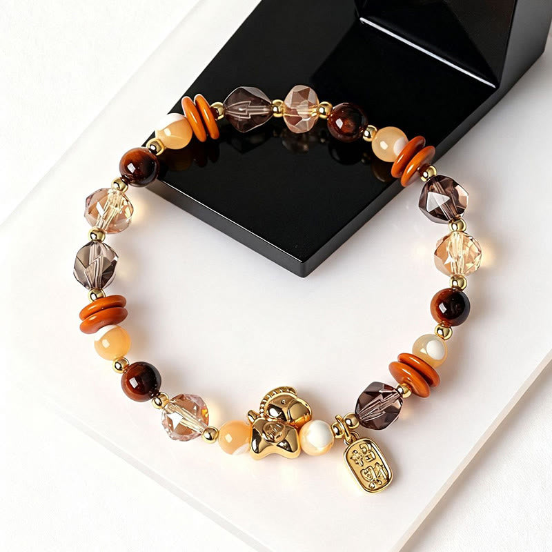 Armband Tigerauge Obsidian Glück Wohlstand Energie Pixiu goldener Anhänger