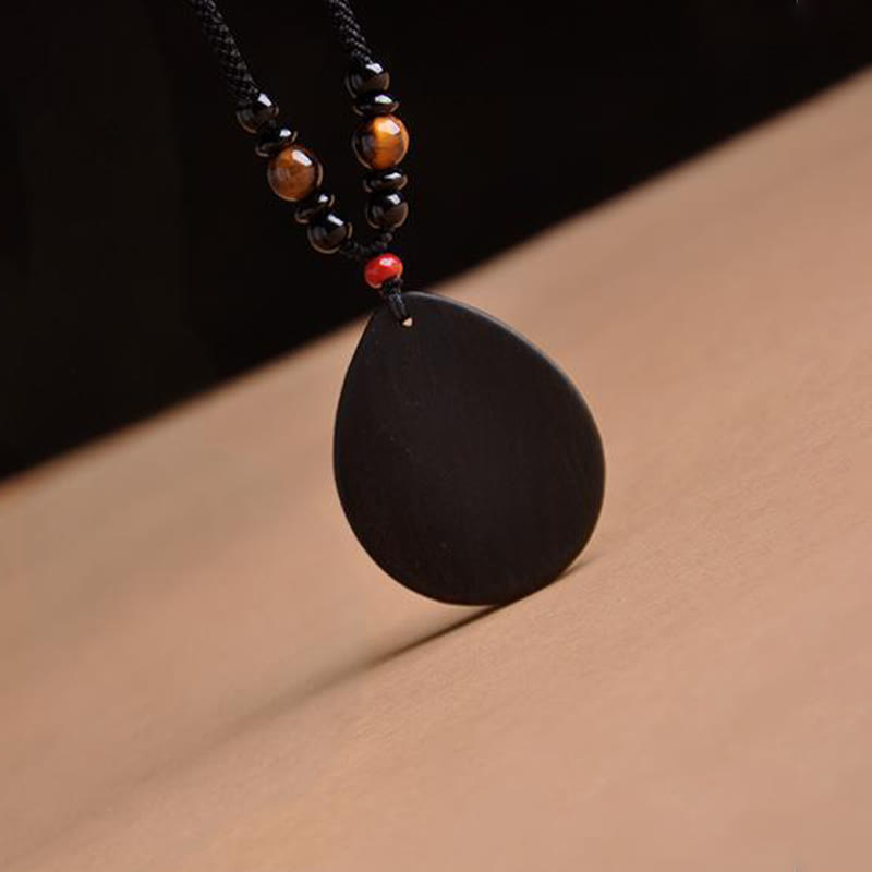 Schwarzer Onyx Anhänger an Kette mit Tigerauge Perlen