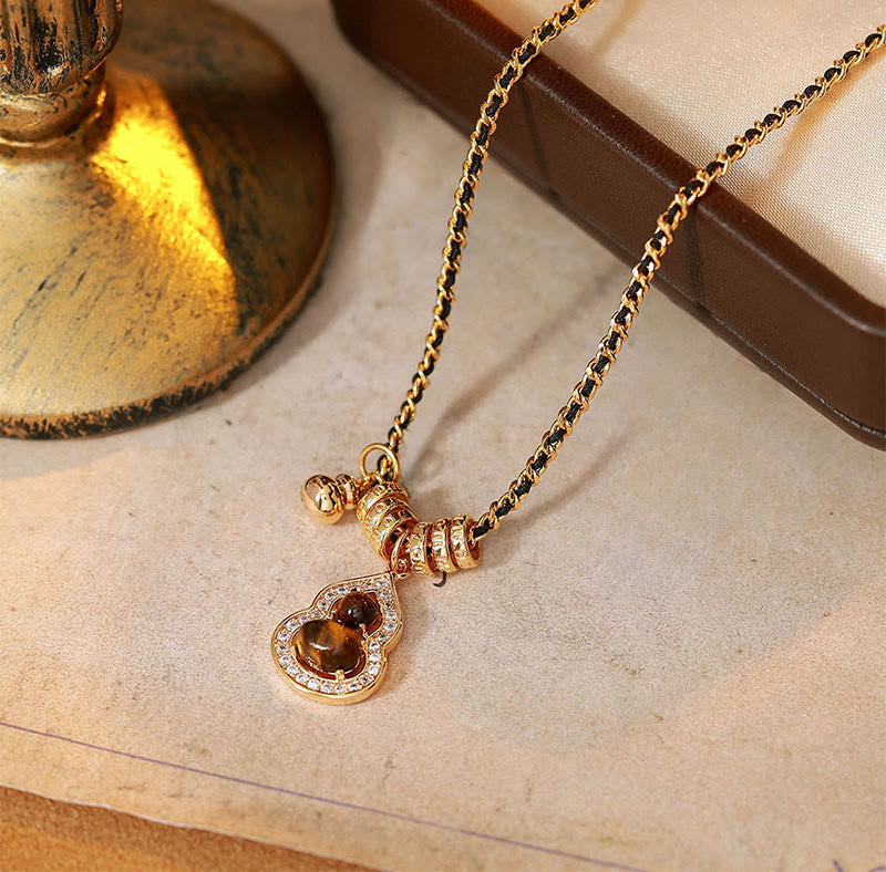 Elegante Kette Tigerauge Doppelkürbis Kupfer für Stärke und Schutz