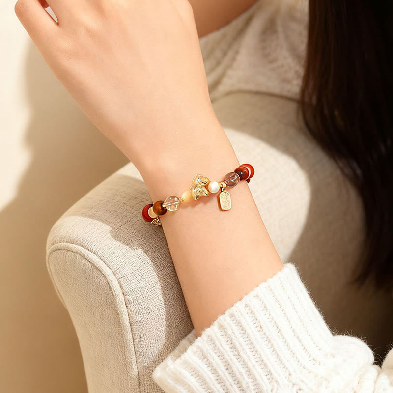 Armband Tigerauge Obsidian Glück Wohlstand Energie am Handgelenk getragen Schutz