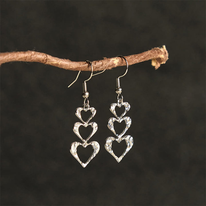 Herz Ohrringe Titanstahl Hammerschlag silber Boho Schmuck spirituell Ohrhänger