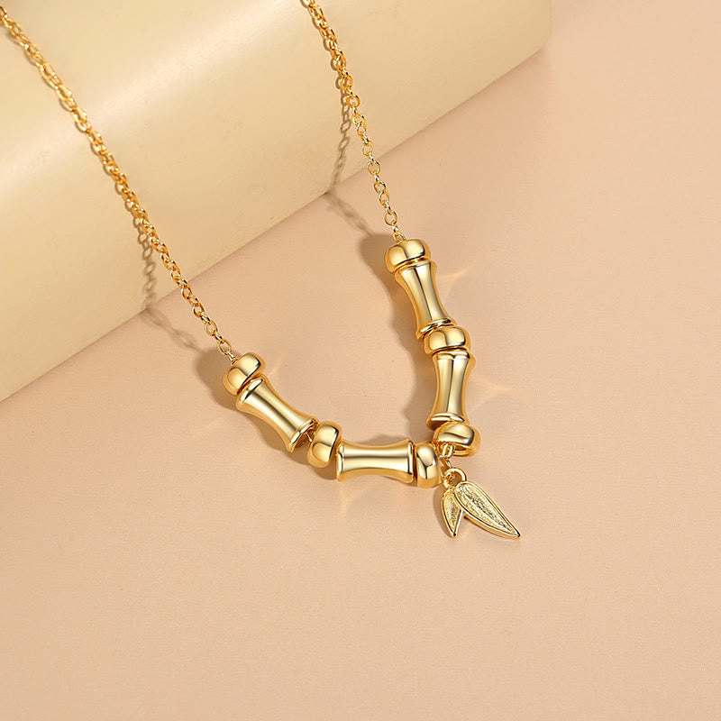 Goldene Kette Bambusmuster Anhänger Blatt Charm Titanstahl elegant Wohlstand