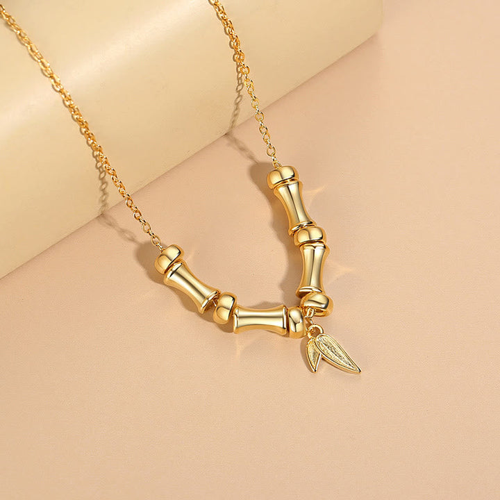 Goldene Kette Bambusmuster Anhänger Blatt Charm Titanstahl elegant Wohlstand