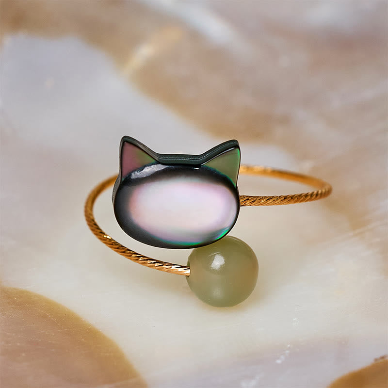Ring Tridacna Katze mit grüner Perle Schutz Charme Glücksbringer