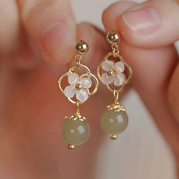 Ohrringe Tridacna Blume Jade gold zart Boho Schmuck spirituell Ohrhänger