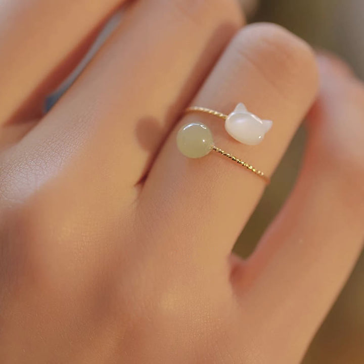 Ring Tridacna Jade Katze Segen eleganter Schmuck mit grünem Stein