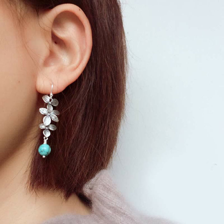 Türkis Ohrringe Silber Blume getragen Boho Schmuck spirituell Ohrhänger