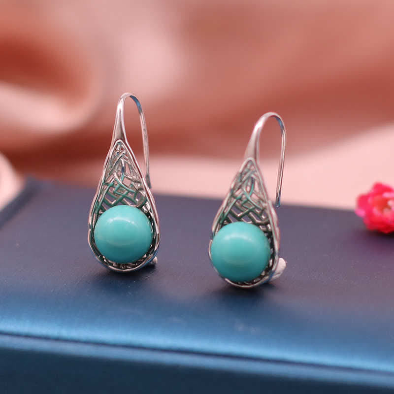 Ohrringe Türkis Silber Schutz filigran Tropfen Boho Schmuck spirituell getragen