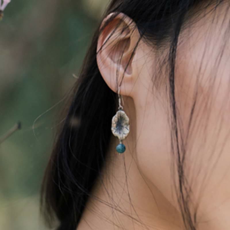 Ohrringe Türkis Lotusblatt Schutz getragen Boho Schmuck spirituell Ohrhänger