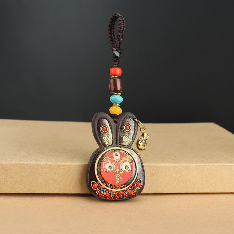 Schlüsselanhänger Ebenholz Thangka – Wohlstand