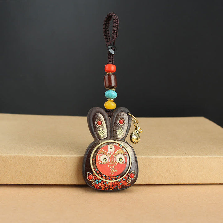 Schlüsselanhänger Ebenholz Thangka – Wohlstand