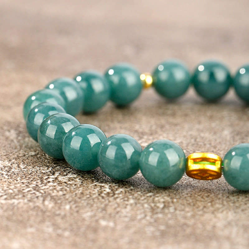 Armband Jade – Fülle & Wohlstand grüne Perlen goldene Akzente Naturstein