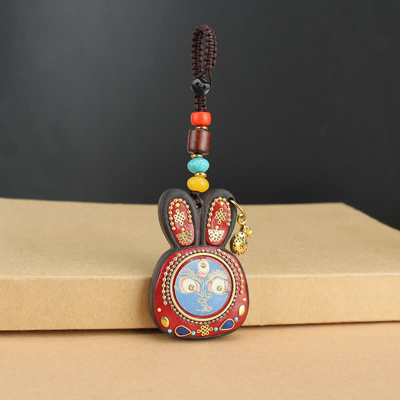 Schlüsselanhänger Ebenholz Thangka – Wohlstand