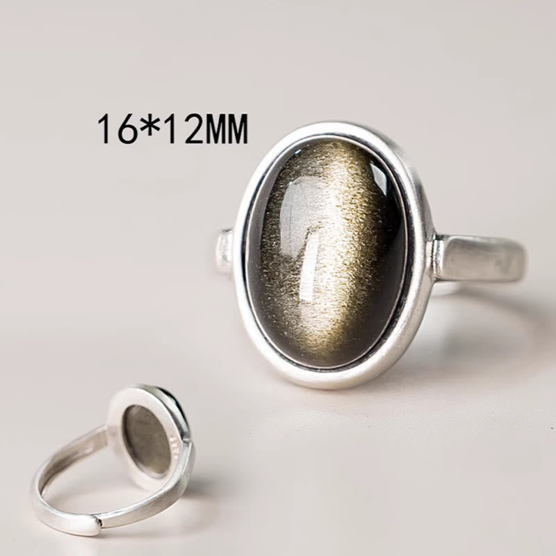 Ring 925 Silber Obsidian goldfarbener Stein Wohlstand Schutz Energie