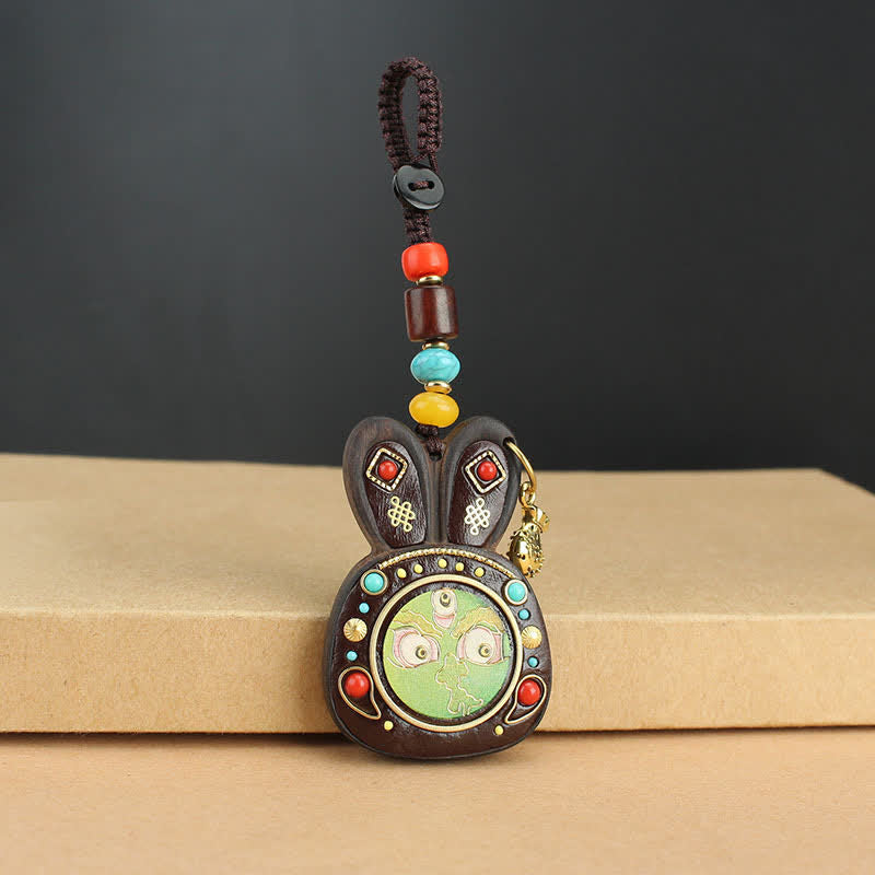 Schlüsselanhänger Ebenholz Thangka – Wohlstand