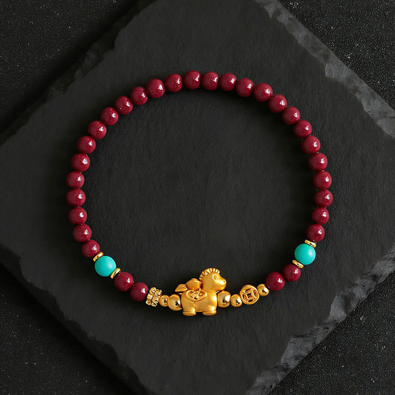 Armband Zinnober Fu-Zeichen Ruhe Energie rote Perlen goldenes Pferd Türkis