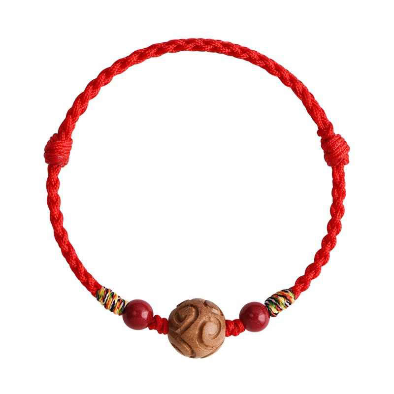 Armband Pfirsichholz Zinnober Glück rote Kordel geschnitzte Perle Handgelenk