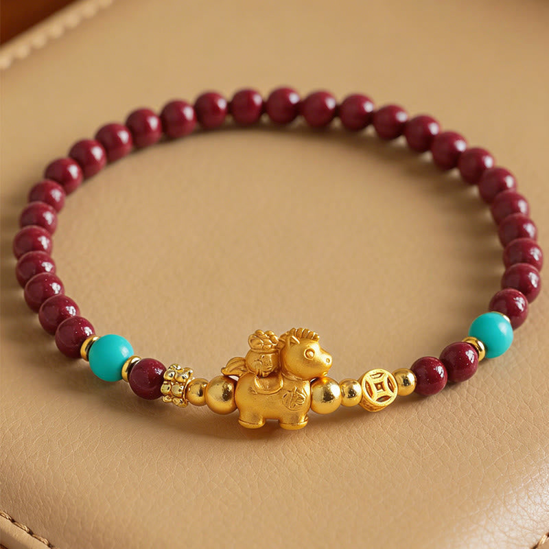 Armband Zinnober Fu-Zeichen Ruhe Energie goldenes Pferd türkis Perlen