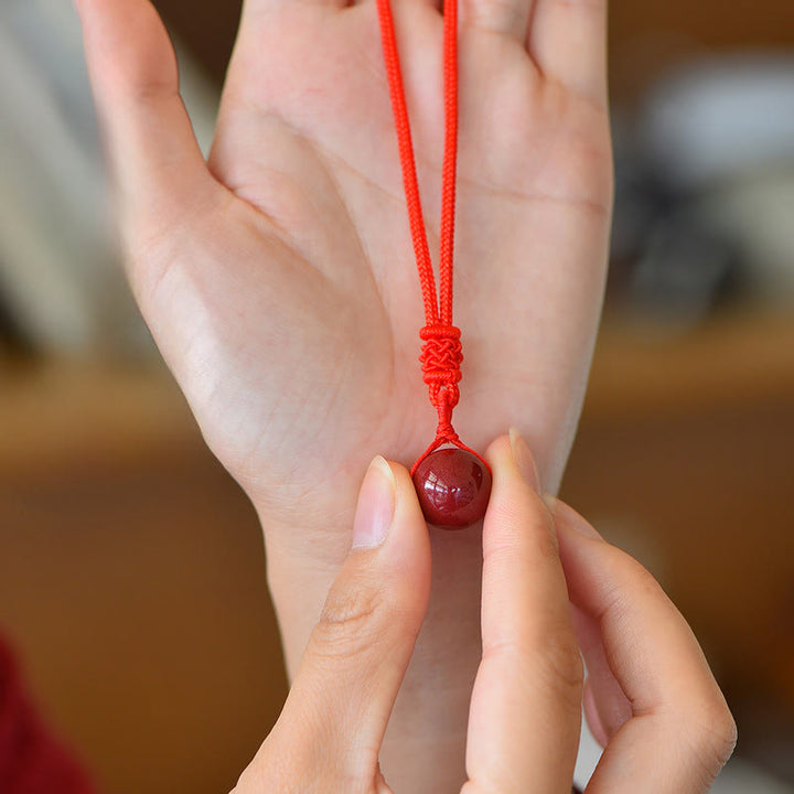Rote Zinnober Kette in Hand Anhänger Böses Auge Naturstein Schmuck