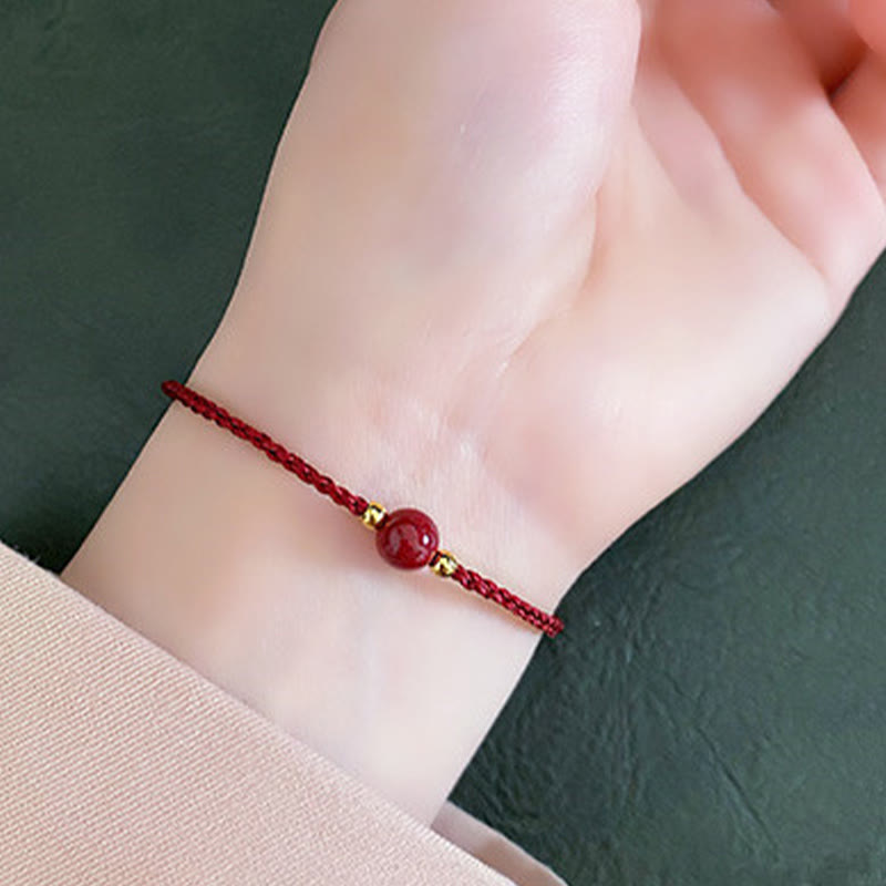 Armband Zinnober Rotes Band am Handgelenk getragen Schutz Glück Fengshui