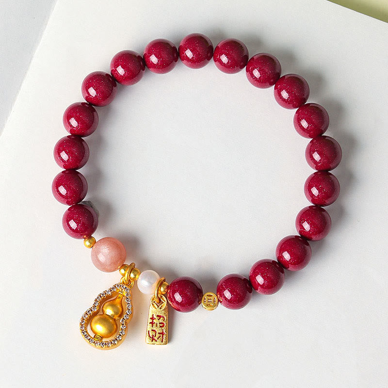 Armband Zinnober – Segen & Glück mit goldener Kürbis Anhänger Perle