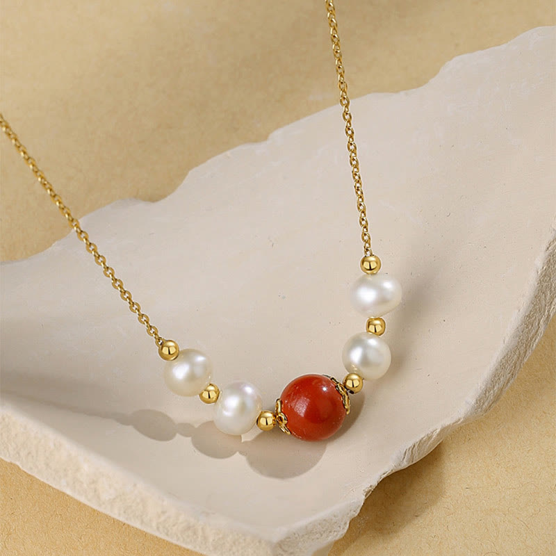 Goldene Kette mit weißen Perlen und rotem Zinnober Anhänger Sterlingsilber Heilung