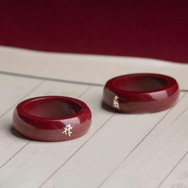 Rote Zinnober Ringe mit chinesischen Schriftzügen Feng Shui Symbol Segen