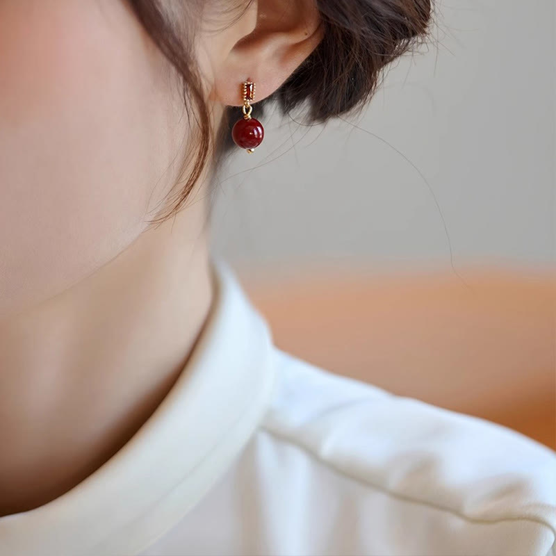 Zinnober Ohrringe Silber getragen elegant Boho Schmuck spirituell Ohrhänger Ruhe
