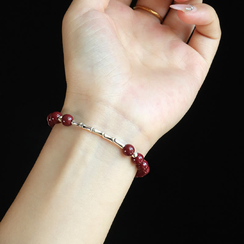 Armband 925 Silber Zinnober Ruhe Energie am Handgelenk getragen elegant